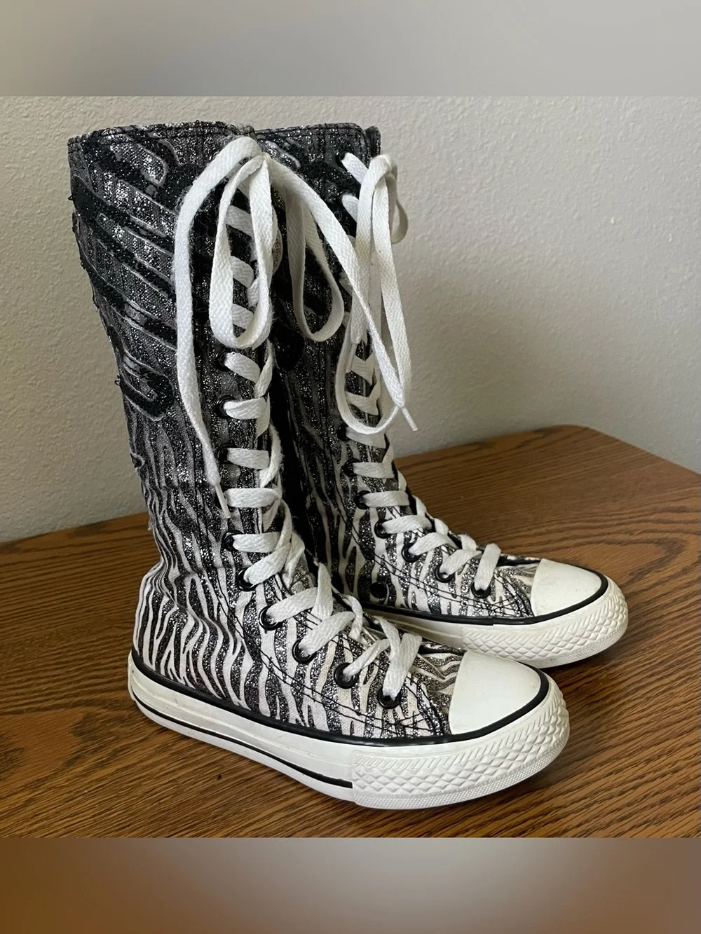 High-Top Zebra Print Lace-Up Sneakers in Black and White